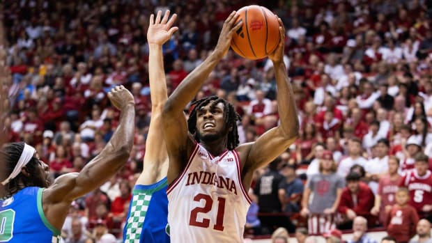 Indiana's Mackenzie Mgbako (21) shoots during the first half of the Indiana versus Florida Gulf Coast men's basketball game at Simon Skjodt Assembly Hall on Tuesday, Nov. 7, 2023.